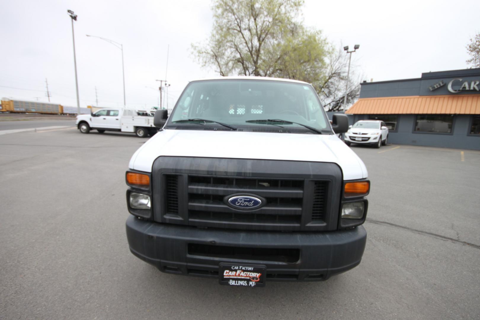 2014 White /Grey Ford E-Series Van (1FTSS3EL3ED) with an 5.4L V8 engine, Automatic transmission, located at 4562 State Avenue, Billings, MT, 59101, (406) 896-9833, 45.769516, -108.526772 - 2014 Ford E-350 Super Duty Extended Cargo Van - One owner - 62,000 miles! 5.4L V8 SOHC 16V FFV Engine - 4 speed automatic transmission - rear wheel drive - 62,752 miles - One owner - Inspected and serviced - Ready to go to work today! Air conditioning - tilt steering wheel - AM/FM audio - powe - Photo#8